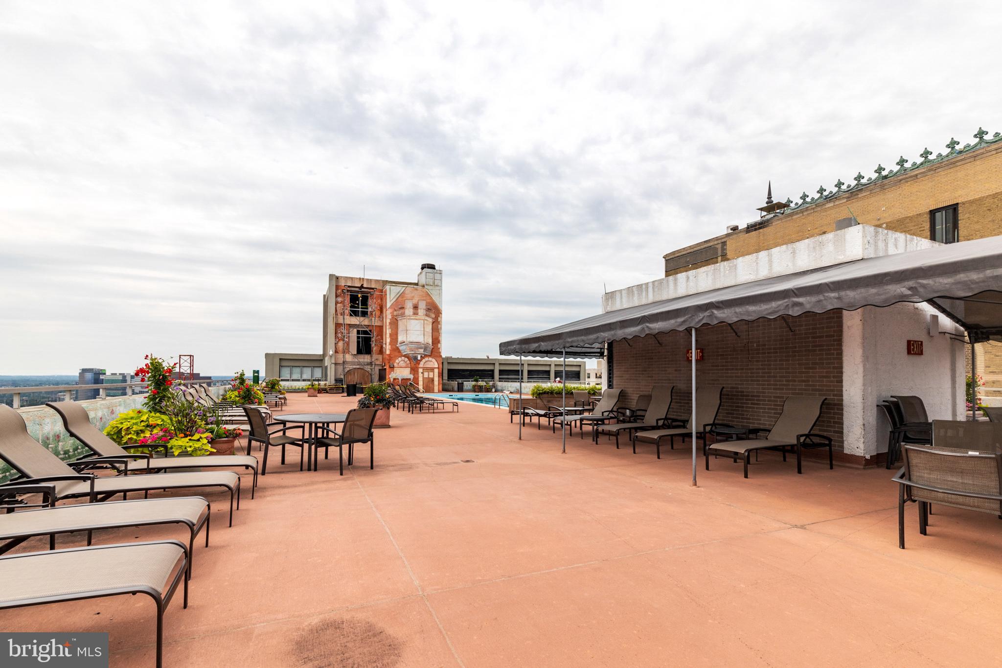 224-30 West Rittenhouse Square, Unit 1201 Philadelphia, PA 19103 - Photo 30 of 34 a view of a terrace with chairs and a terrace