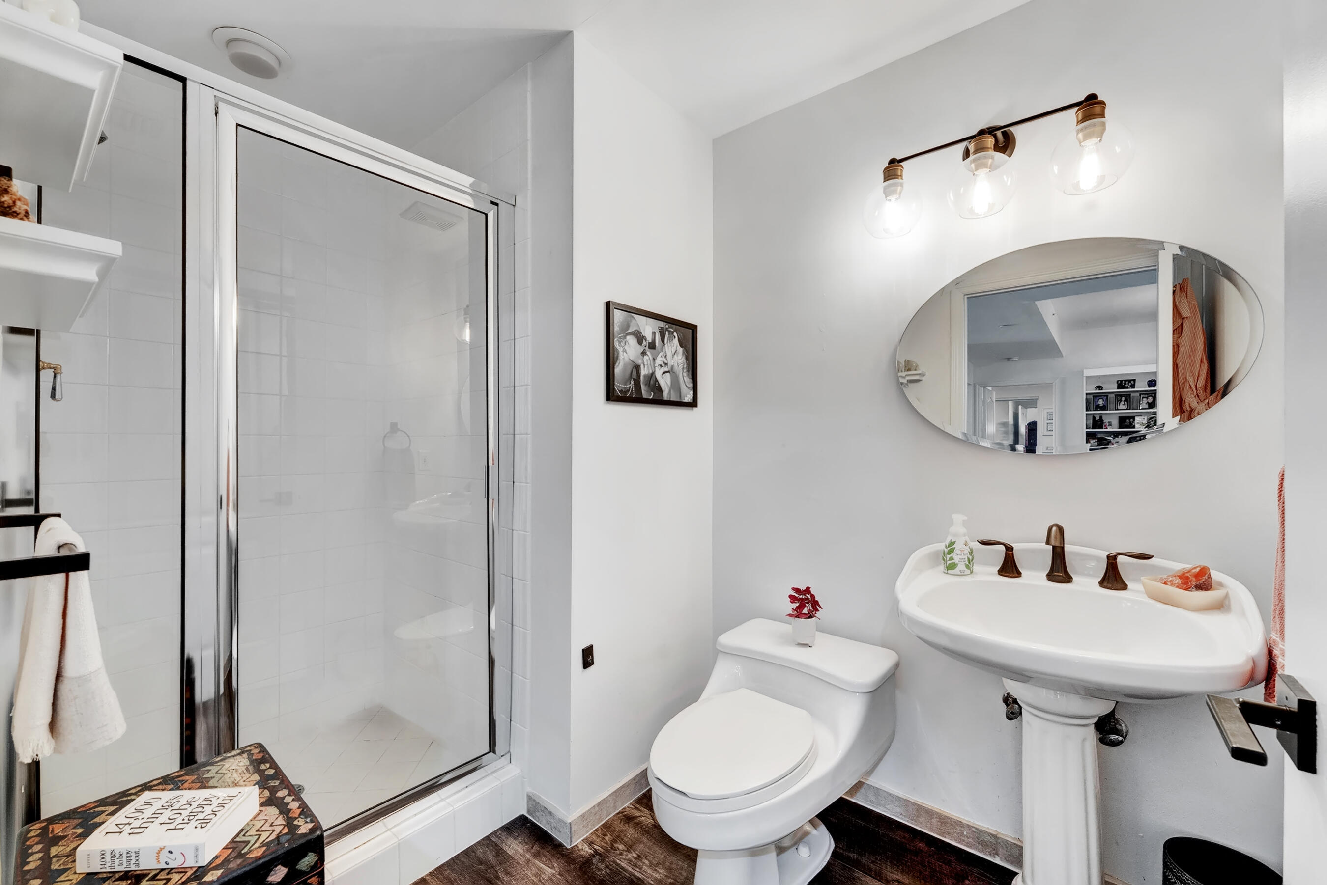 500 Southeast Mizner Boulevard, Unit A710 Boca Raton, FL 33432 - Photo 16 of 50 a bathroom with a sink toilet and a mirror