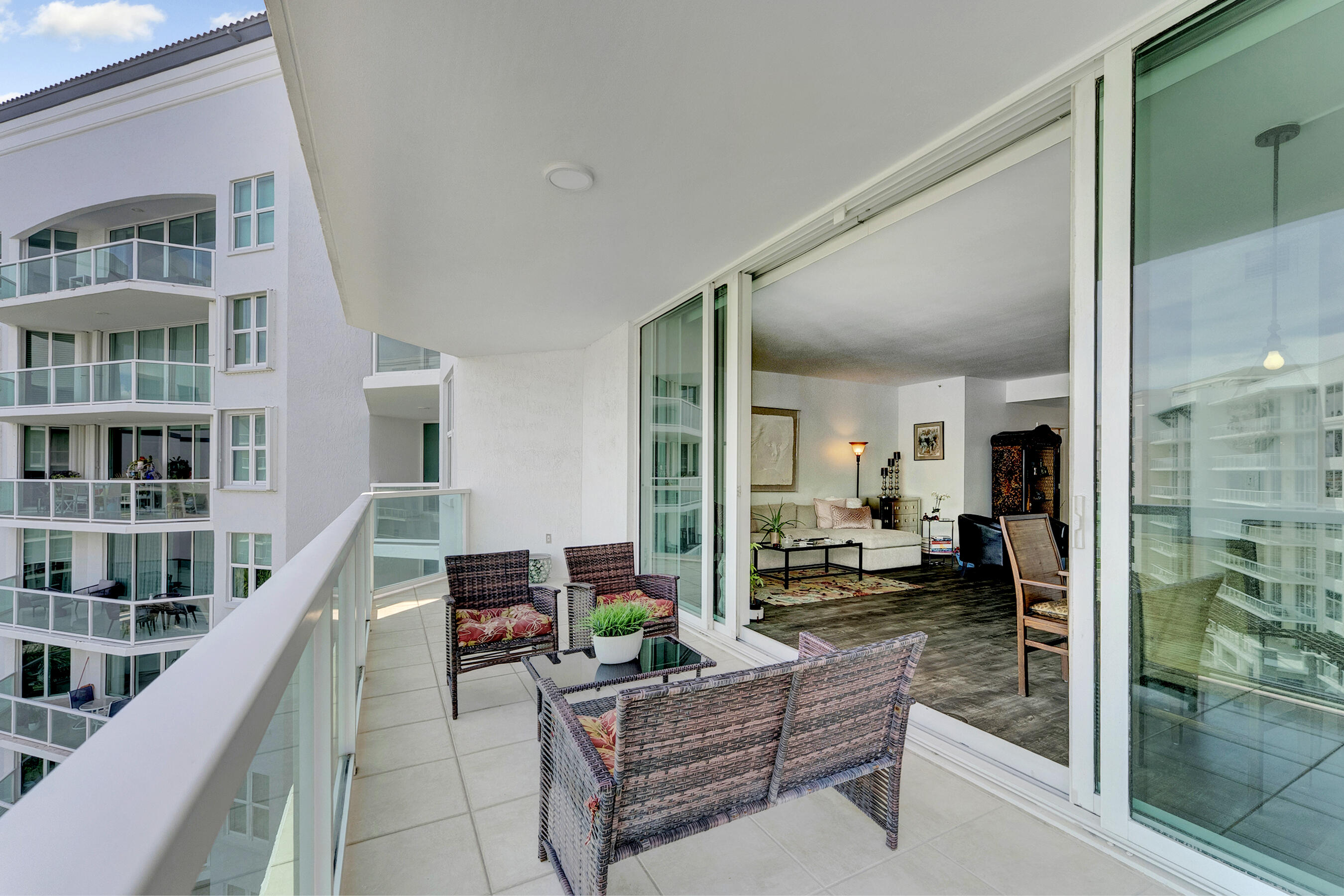 500 Southeast Mizner Boulevard, Unit A710 Boca Raton, FL 33432 - Photo 19 of 50 a living room with furniture and a floor to ceiling window
