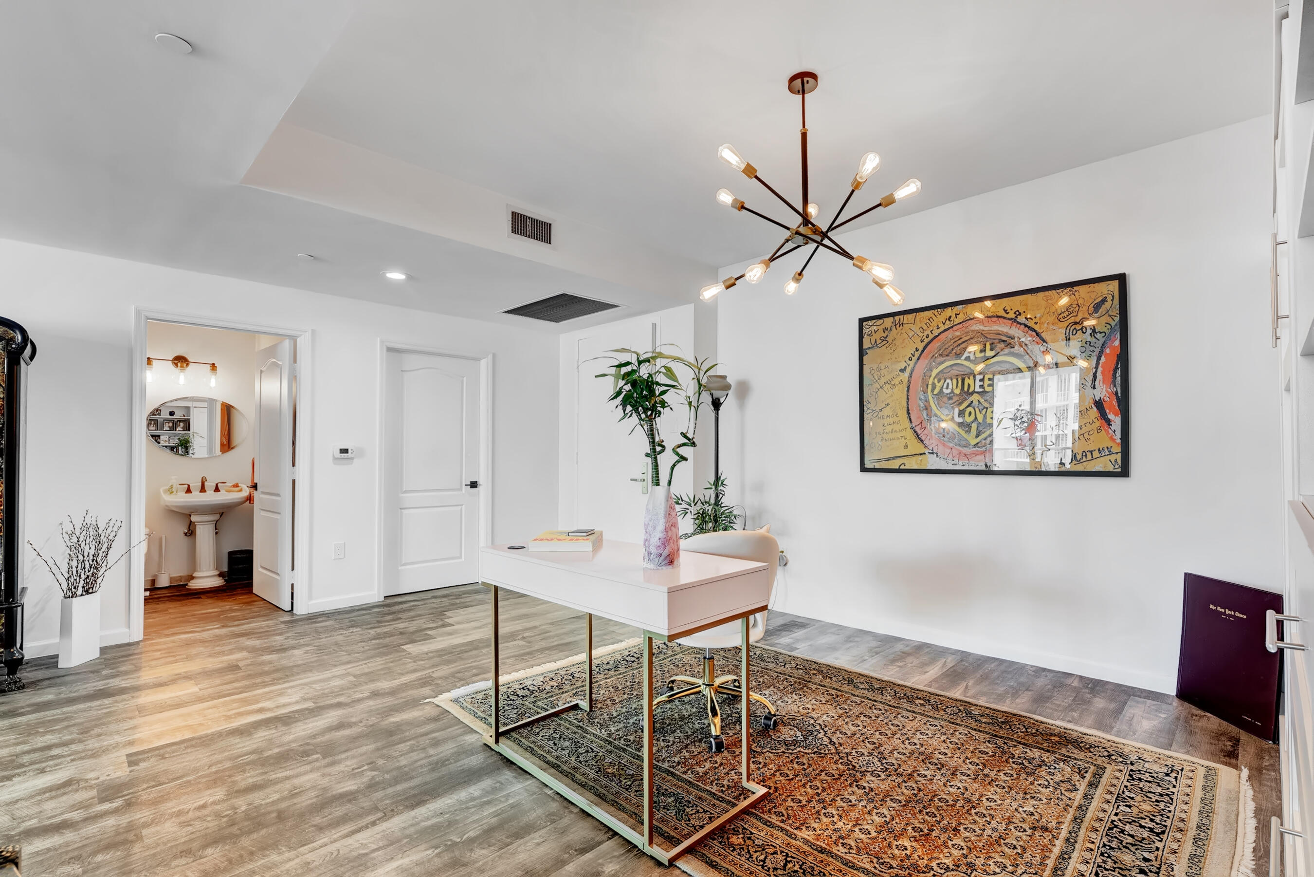 500 Southeast Mizner Boulevard, Unit A710 Boca Raton, FL 33432 - Photo 21 of 50 a living room with furniture a chandelier and a window