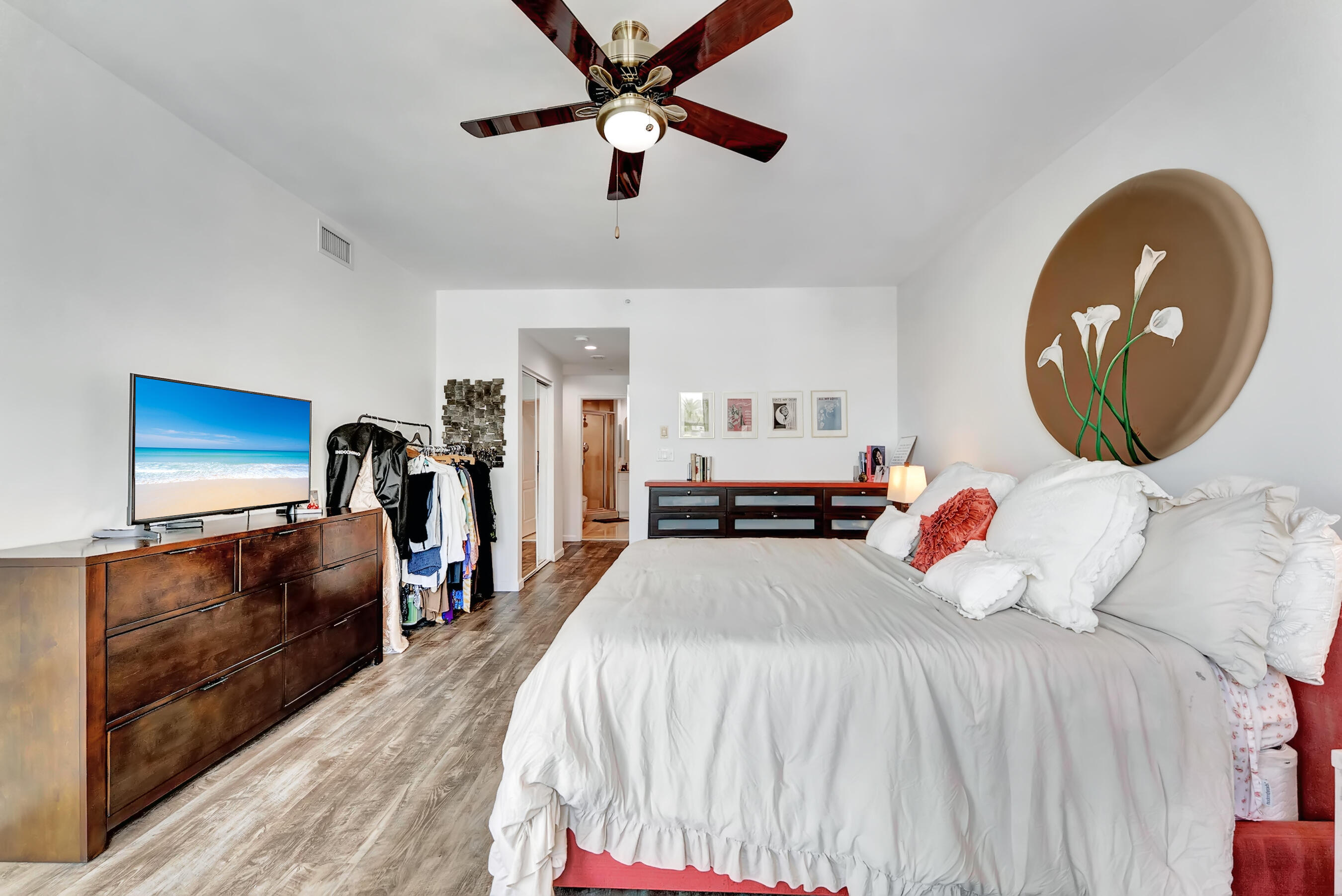 500 Southeast Mizner Boulevard, Unit A710 Boca Raton, FL 33432 - Photo 28 of 50 a bedroom with a bed and a view of kitchen