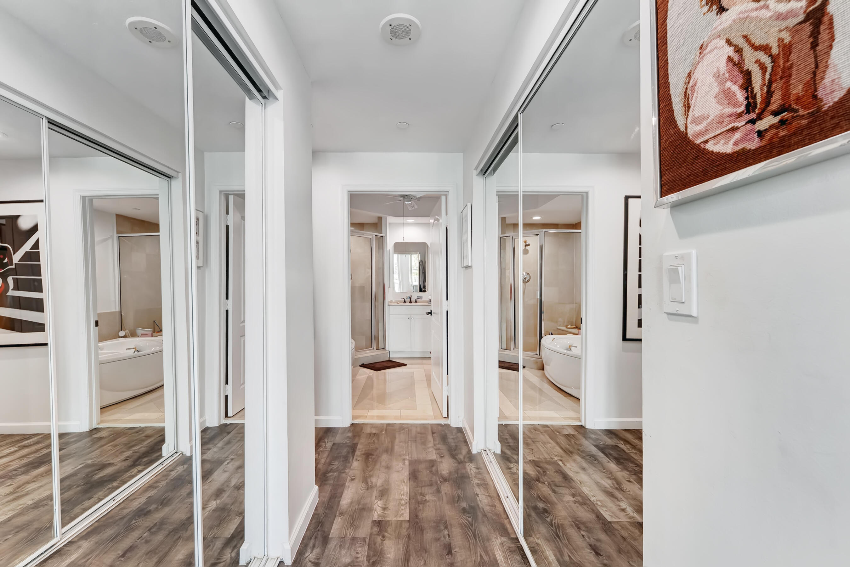 500 Southeast Mizner Boulevard, Unit A710 Boca Raton, FL 33432 - Photo 29 of 50 a view of a hallway with wooden floor and staircase