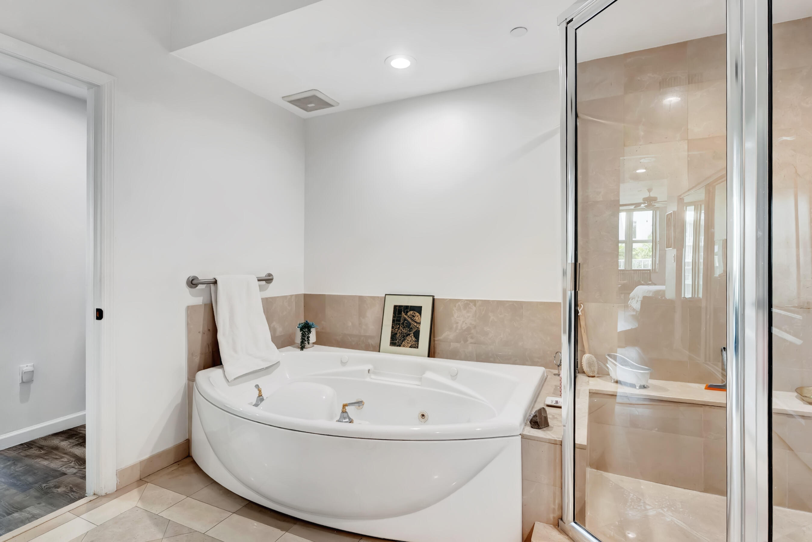 500 Southeast Mizner Boulevard, Unit A710 Boca Raton, FL 33432 - Photo 32 of 50 a bathroom with a bathtub and shower