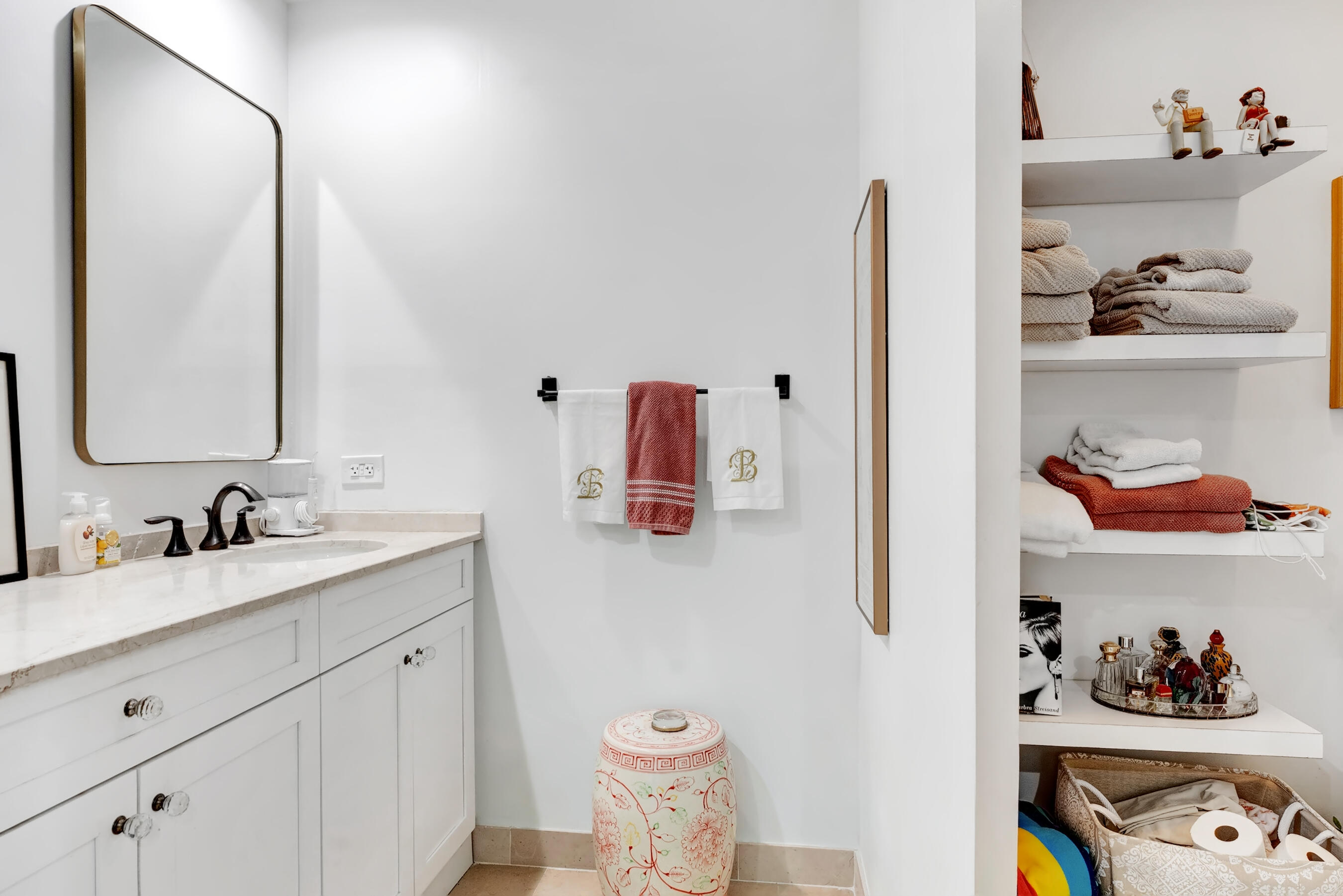 500 Southeast Mizner Boulevard, Unit A710 Boca Raton, FL 33432 - Photo 33 of 50 a bathroom with a sink and a mirror