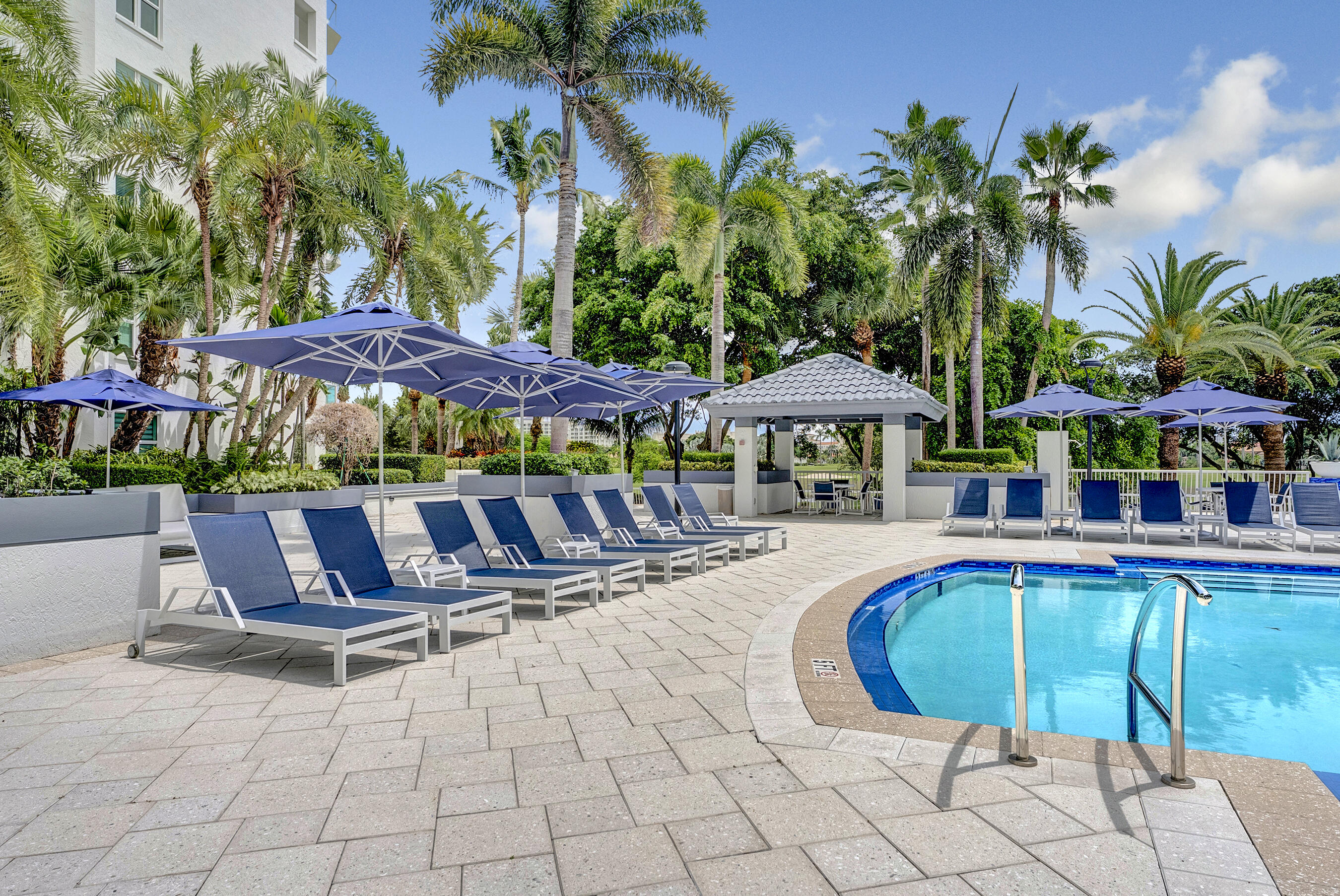 500 Southeast Mizner Boulevard, Unit A710 Boca Raton, FL 33432 - Photo 46 of 50 a swimming pool with outdoor seating yard and barbeque oven
