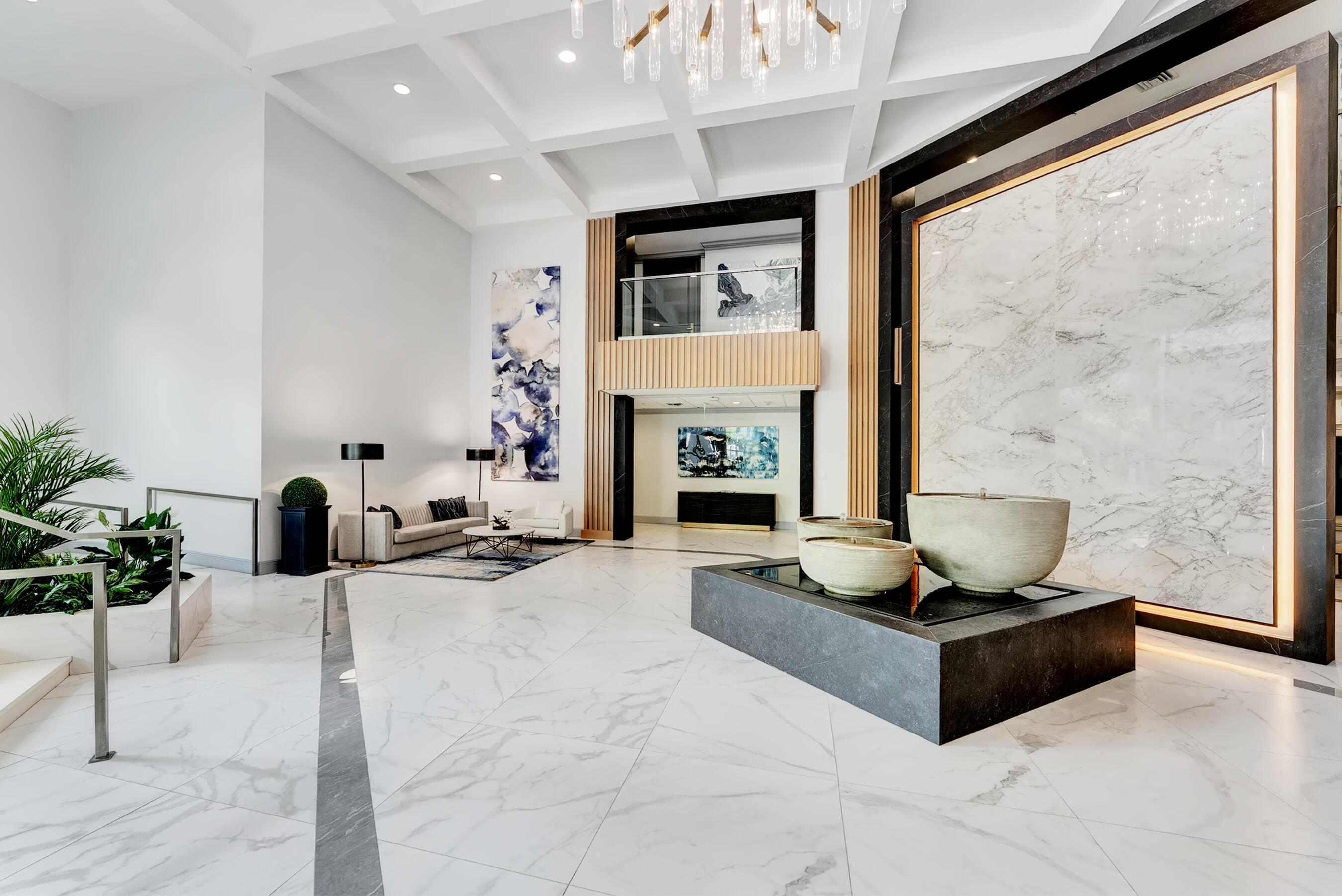 500 Southeast Mizner Boulevard, Unit A710 Boca Raton, FL 33432 - Photo 6 of 50 a living room with furniture and a fireplace