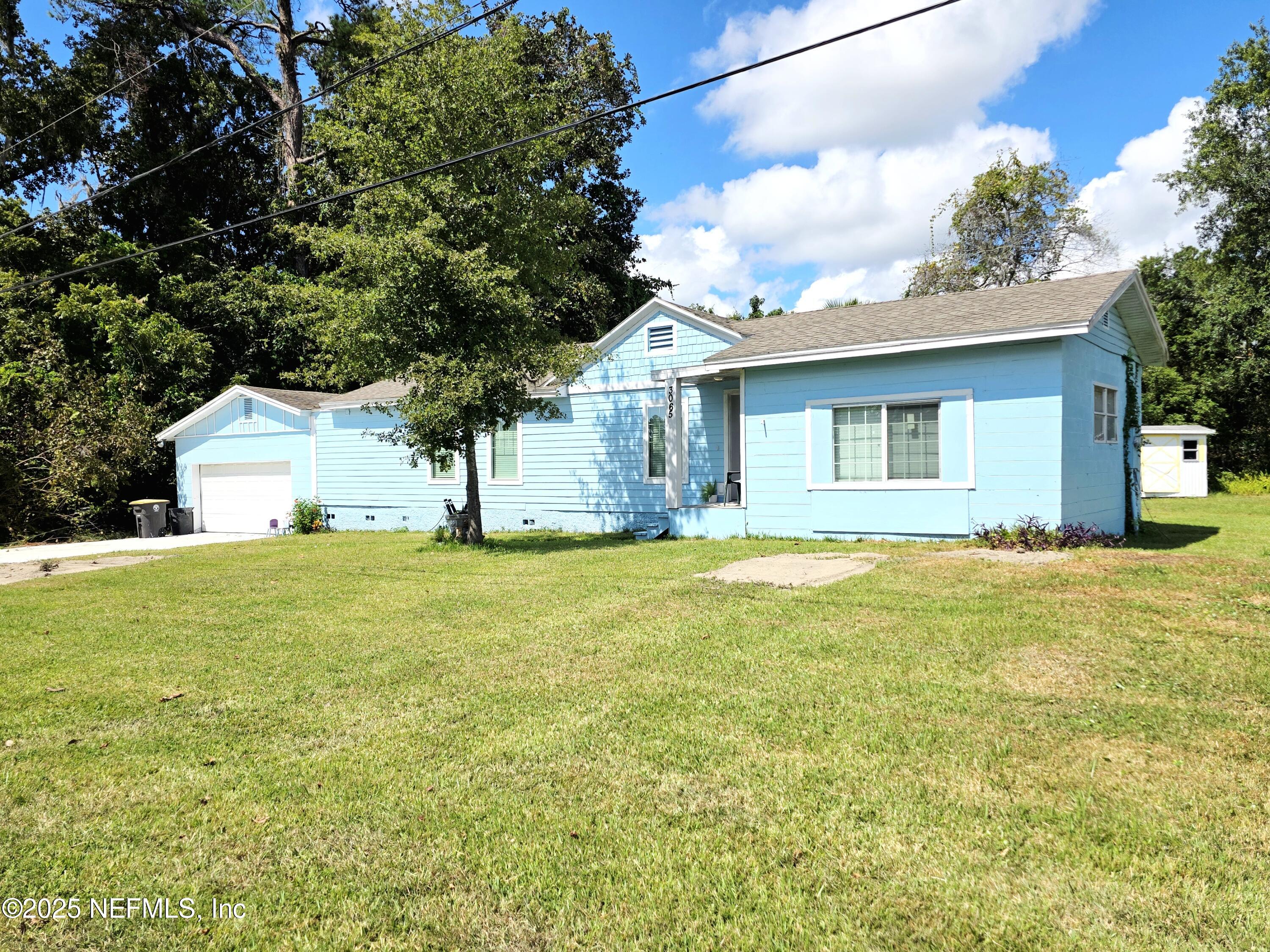 3065 Francis Road Jacksonville, FL 32209 - Photo 3 of 22 a house view with swimming pool in front of it