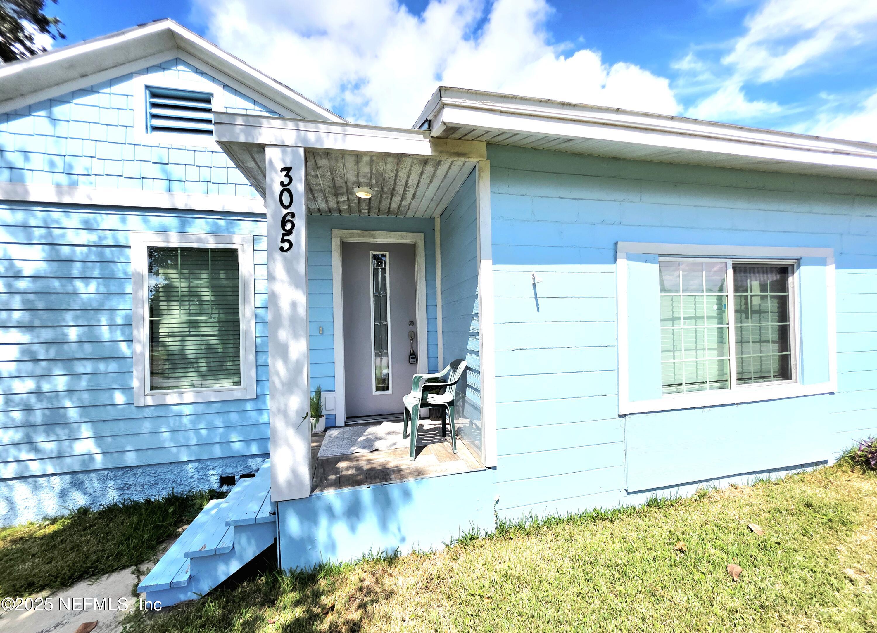 3065 Francis Road Jacksonville, FL 32209 - Photo 5 of 22 a front view of a house with a yard