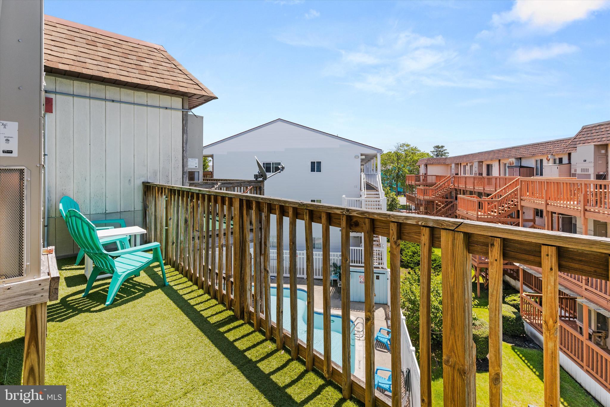 411 146th Street, Unit 332 Ocean City, MD 21842 - Photo 20 of 22 a view of a balcony with chairs