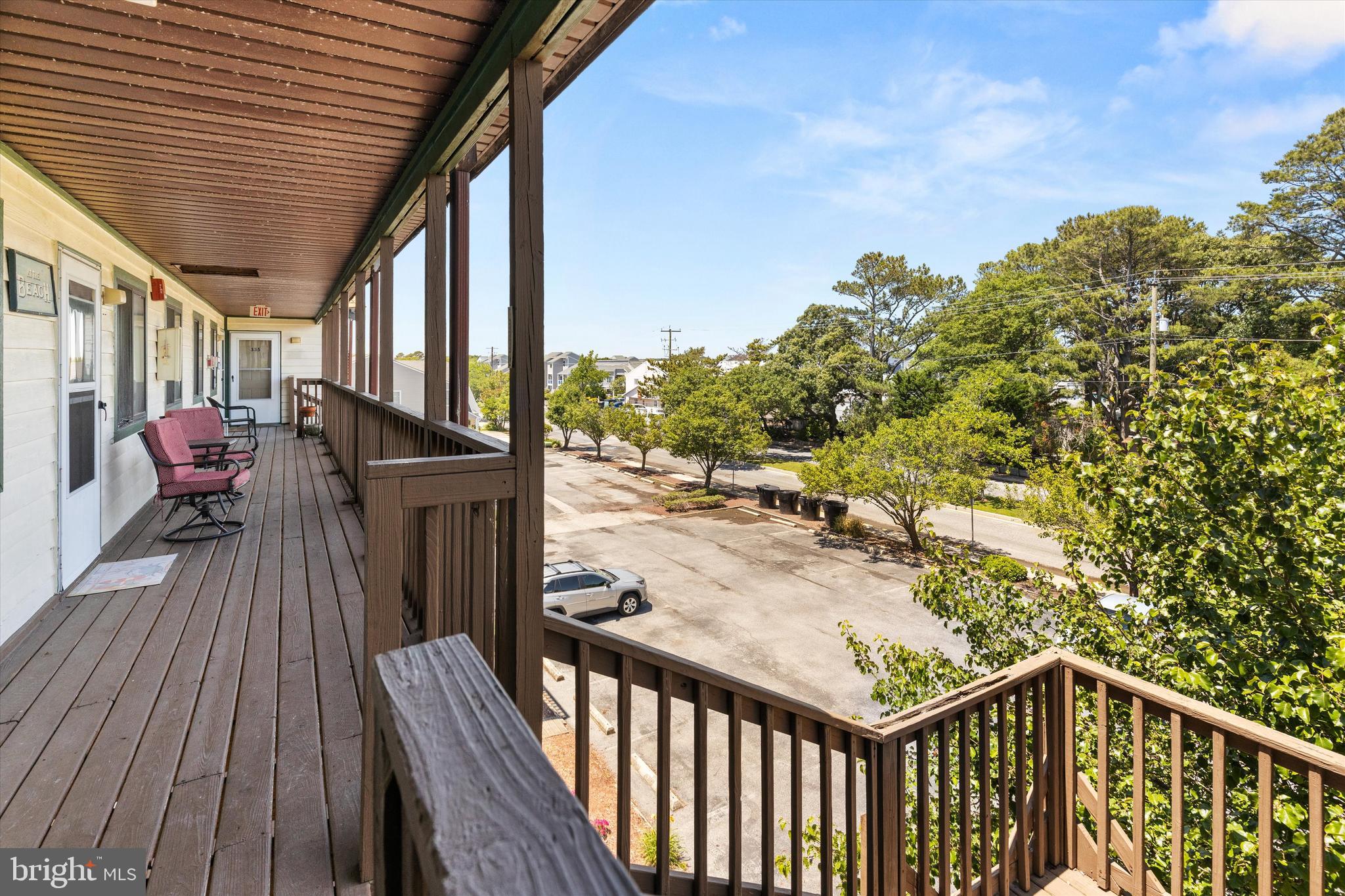 411 146th Street, Unit 332 Ocean City, MD 21842 - Photo 2 of 22 a view of a balcony with furniture