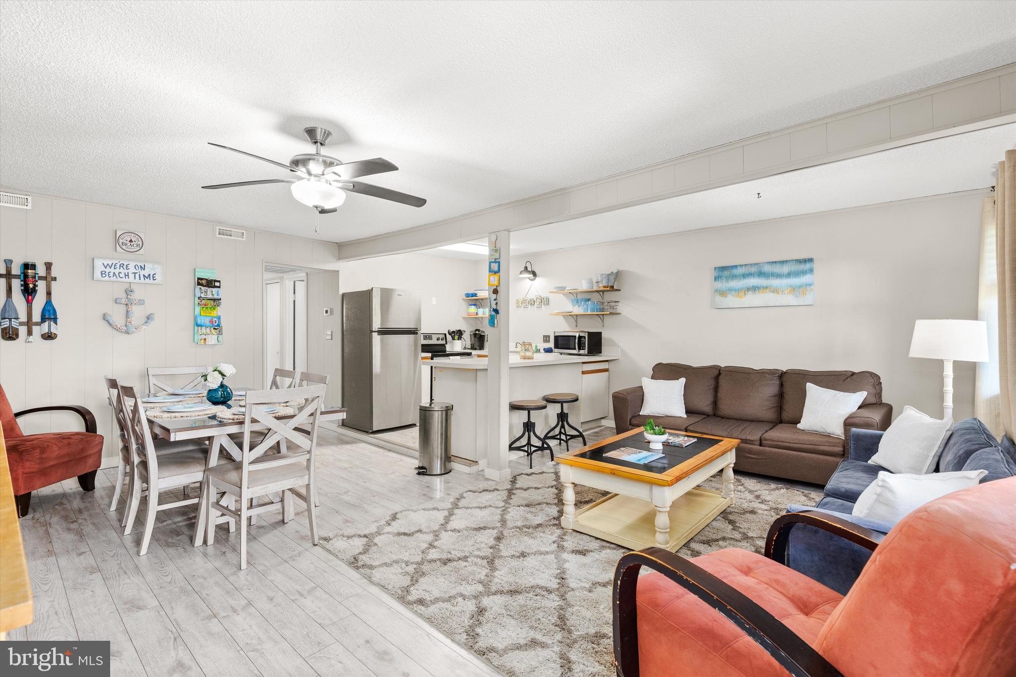 411 146th Street, Unit 332 Ocean City, MD 21842 - Photo 4 of 22 a living room with furniture and wooden floor