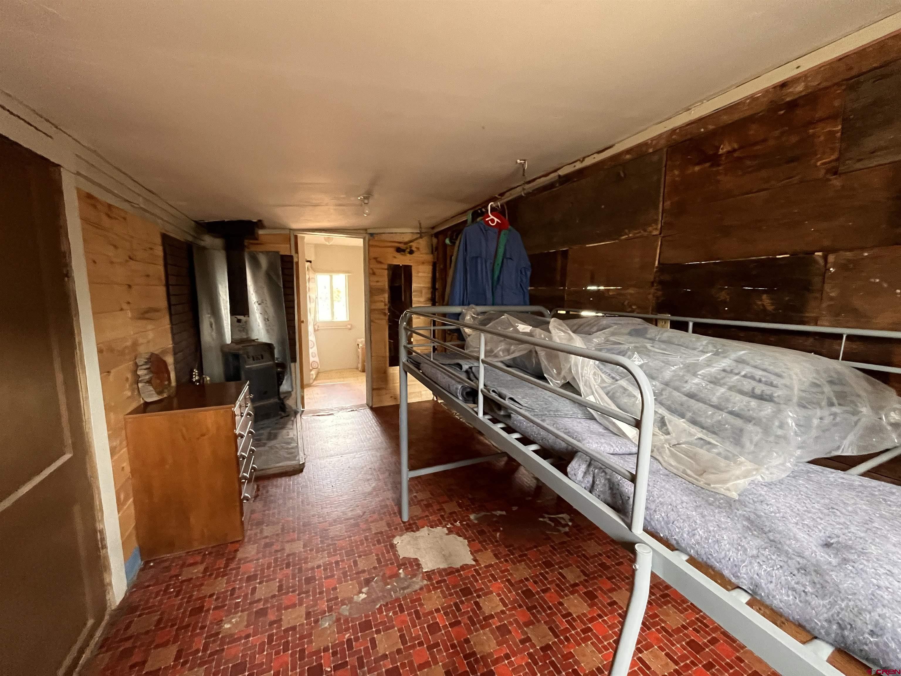 12753 Rd R Cahone, CO 81320 - Photo 20 of 24 a view of kitchen with furniture and wooden floor