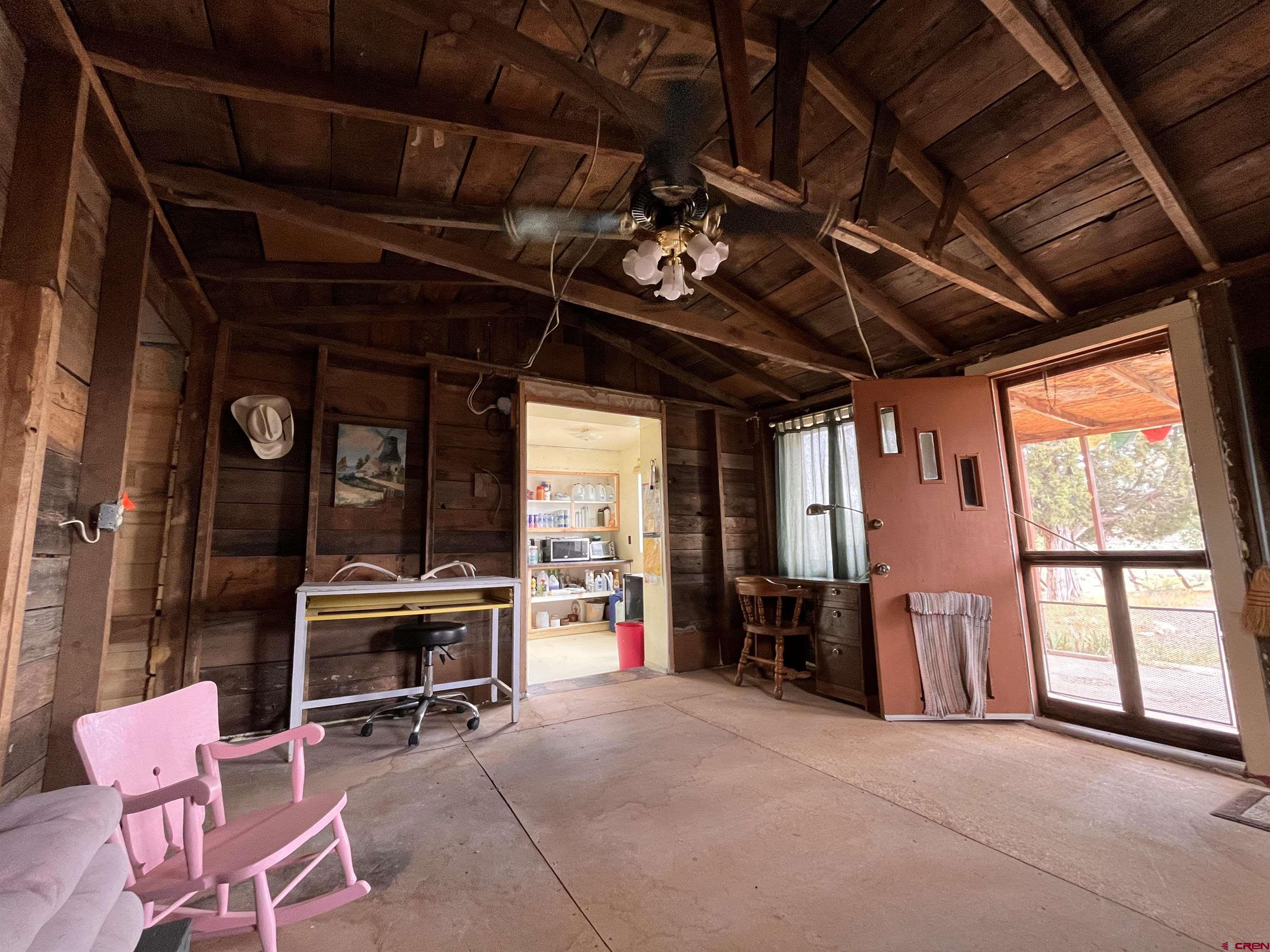 12753 Rd R Cahone, CO 81320 - Photo 23 of 24 a view of livingroom with furniture and a window