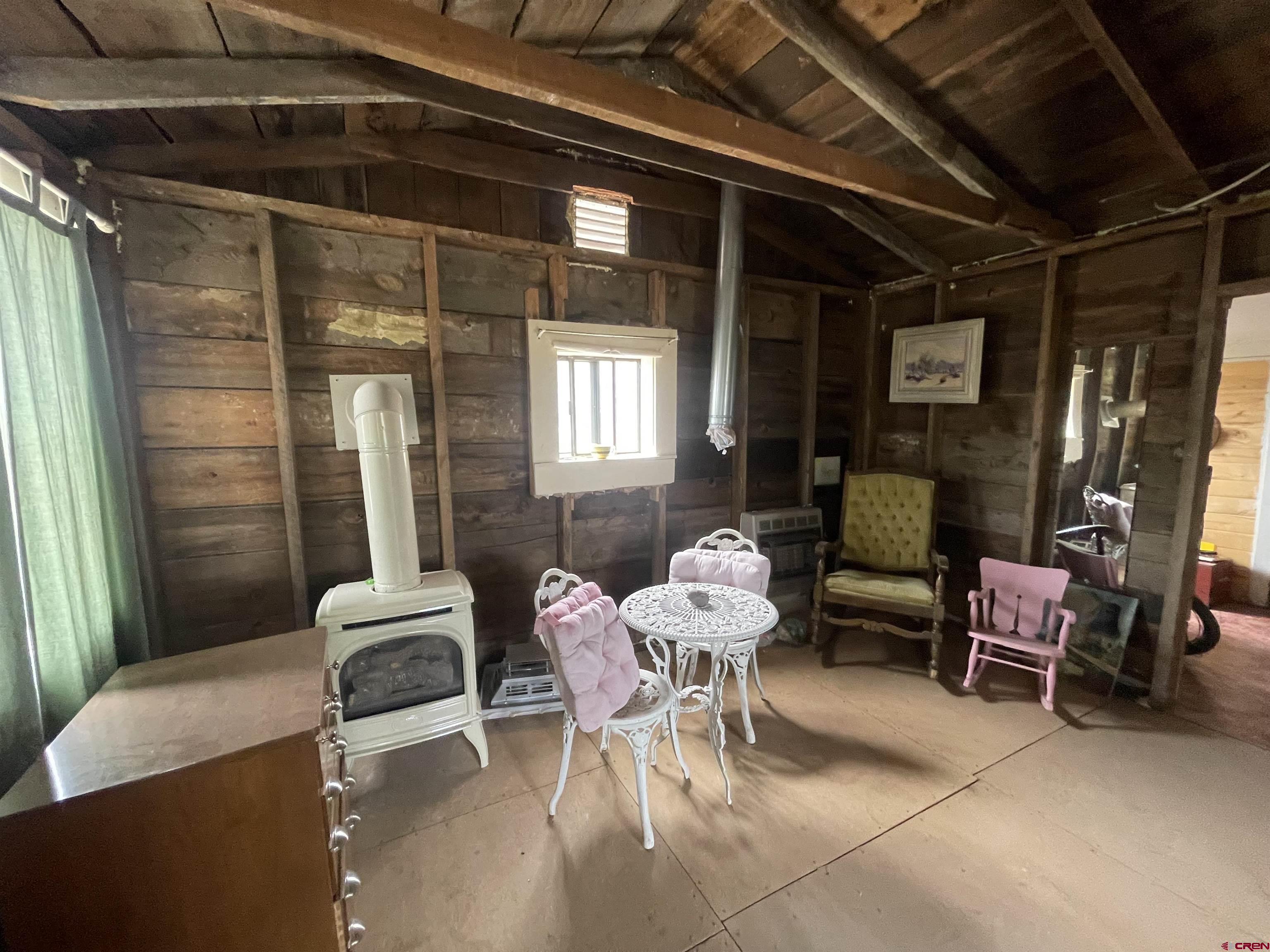 12753 Rd R Cahone, CO 81320 - Photo 3 of 24 a living room with furniture and a window