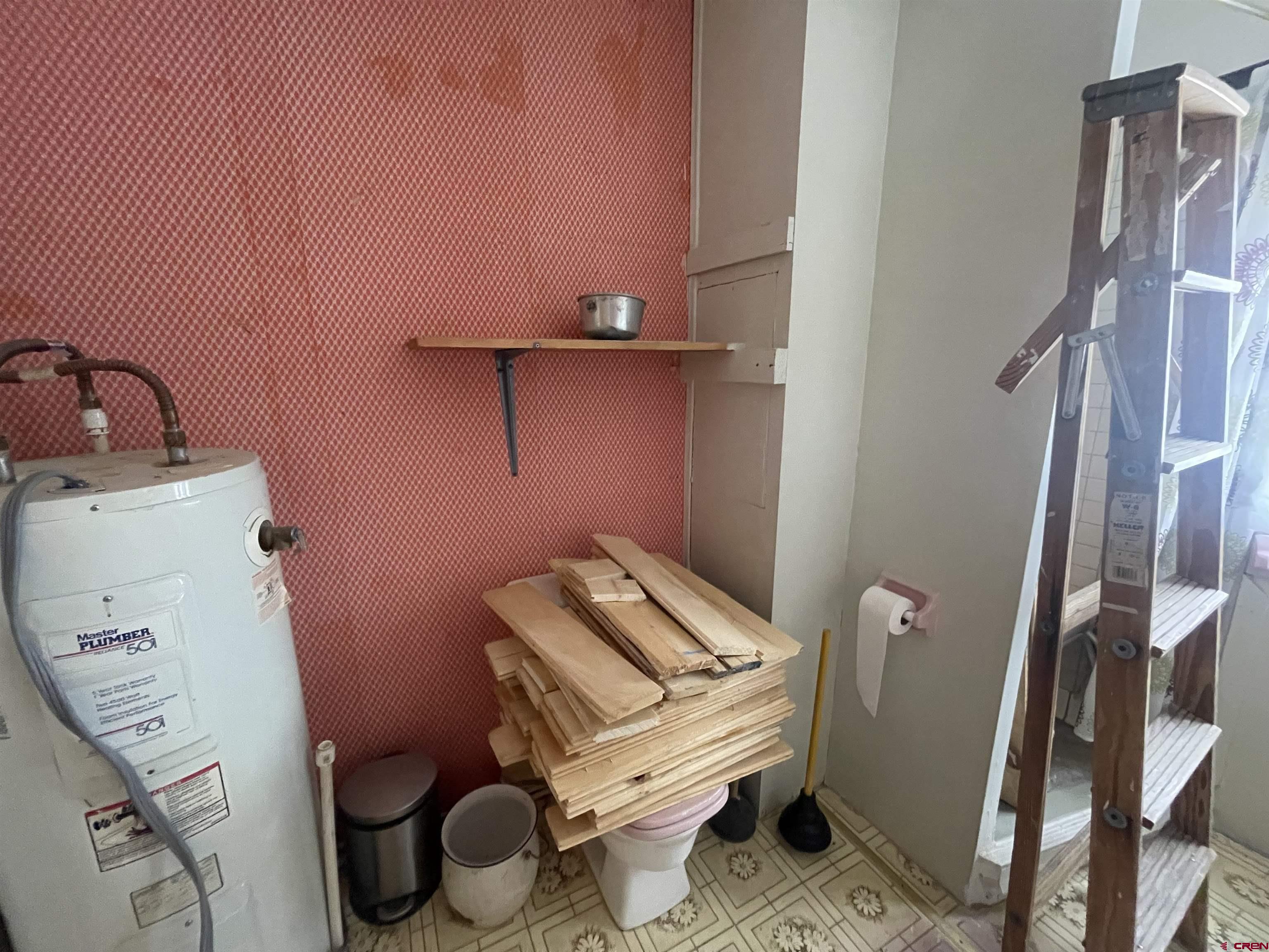 12753 Rd R Cahone, CO 81320 - Photo 10 of 24 a bathroom with a toilet and a sink