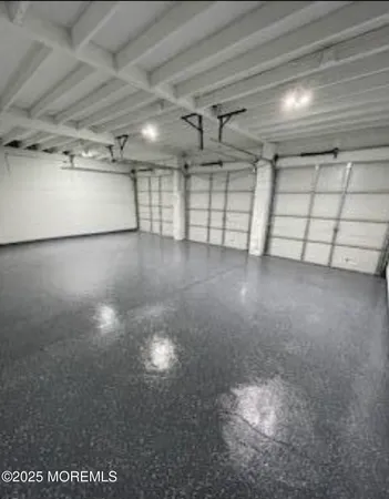 a view of a room with an empty space