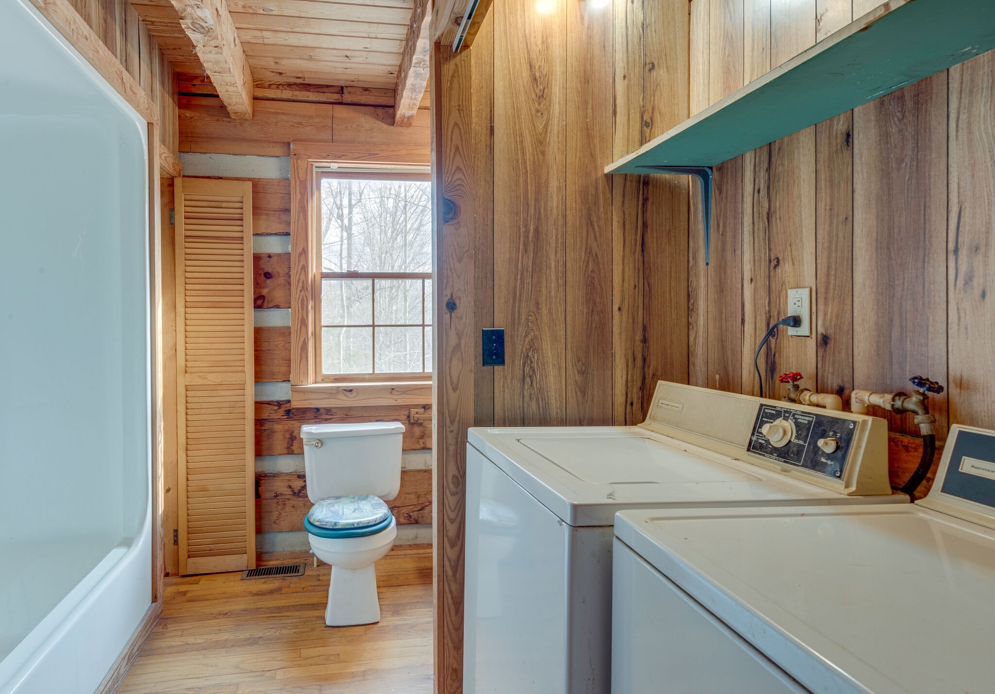 1012 Peery Road Kingston Springs, TN 37082 - Photo 22 of 34 a bathroom with a sink a toilet and shower curtain