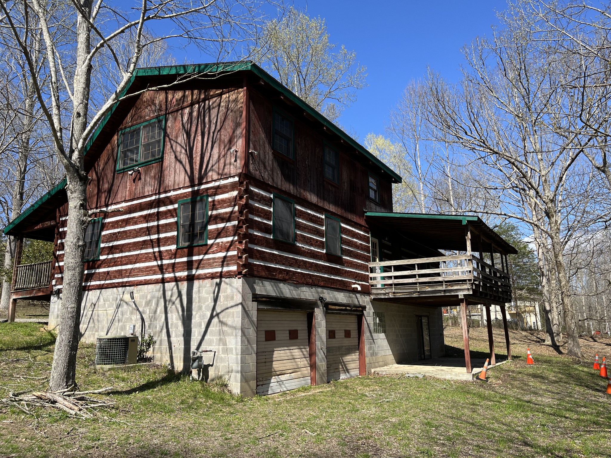 1012 Peery Road Kingston Springs, TN 37082 - Photo 29 of 34 a front view of a house with a garden