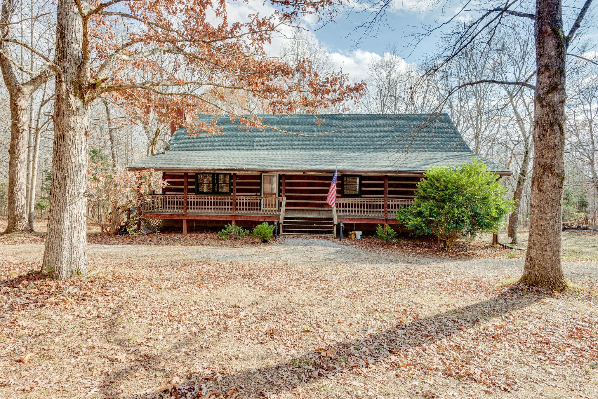 1012 Peery Road Kingston Springs, TN 37082 - Photo 4 of 34 a front view of a house with garden