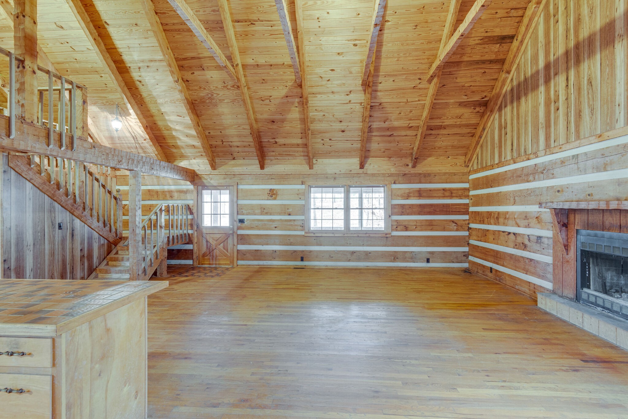 1012 Peery Road Kingston Springs, TN 37082 - Photo 7 of 34 a view of empty room with wooden floor and fan