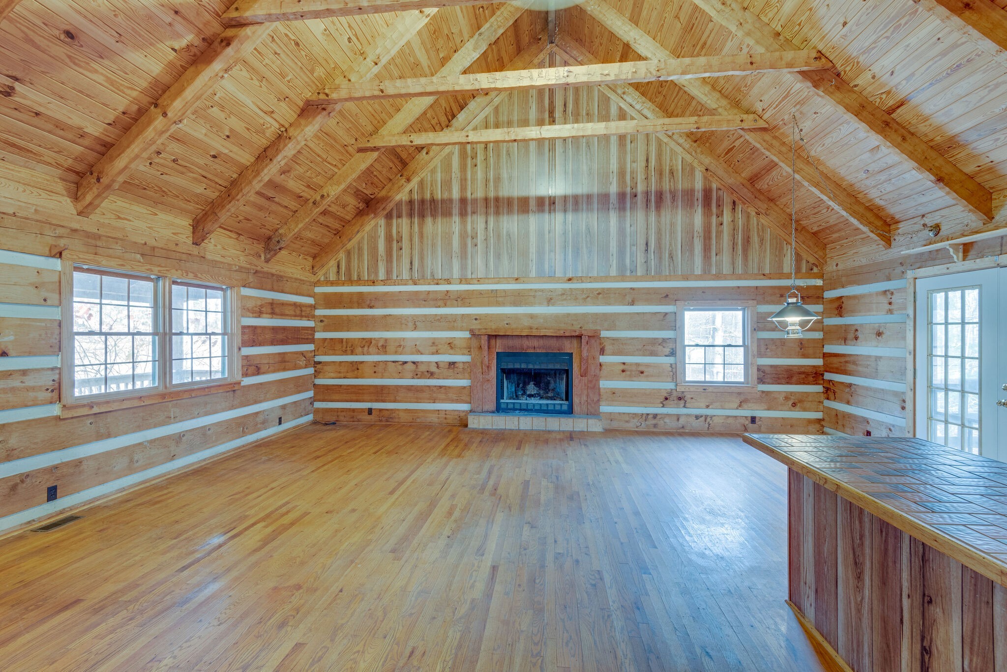 1012 Peery Road Kingston Springs, TN 37082 - Photo 8 of 34 a view of empty room with wooden floor and fireplace