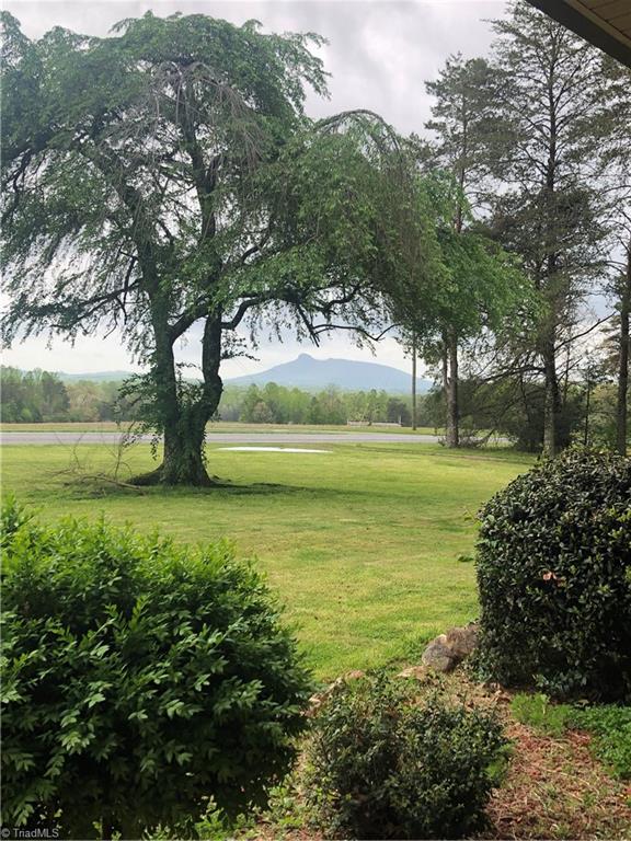 369 Cook Road Pilot Mountain, NC 27041 - Photo 3 of 30 Beautiful view of Pilot Mtn from the front porch and yard.