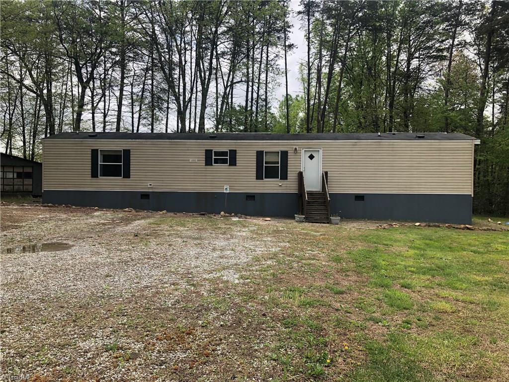 369 Cook Road Pilot Mountain, NC 27041 - Photo 25 of 30 2 bedroom 2 bath Single wide home comes with the property. Located on the back side of the track, has its own driveway.