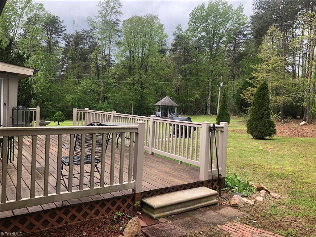 369 Cook Road Pilot Mountain, NC 27041 - Photo 8 of 30 Large deck is great for entertainment.