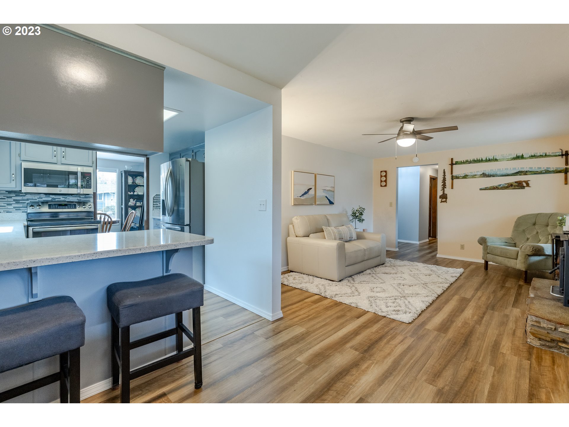 316 70th Street Springfield, OR 97478 - Photo 11 of 25 a living room with furniture and a table