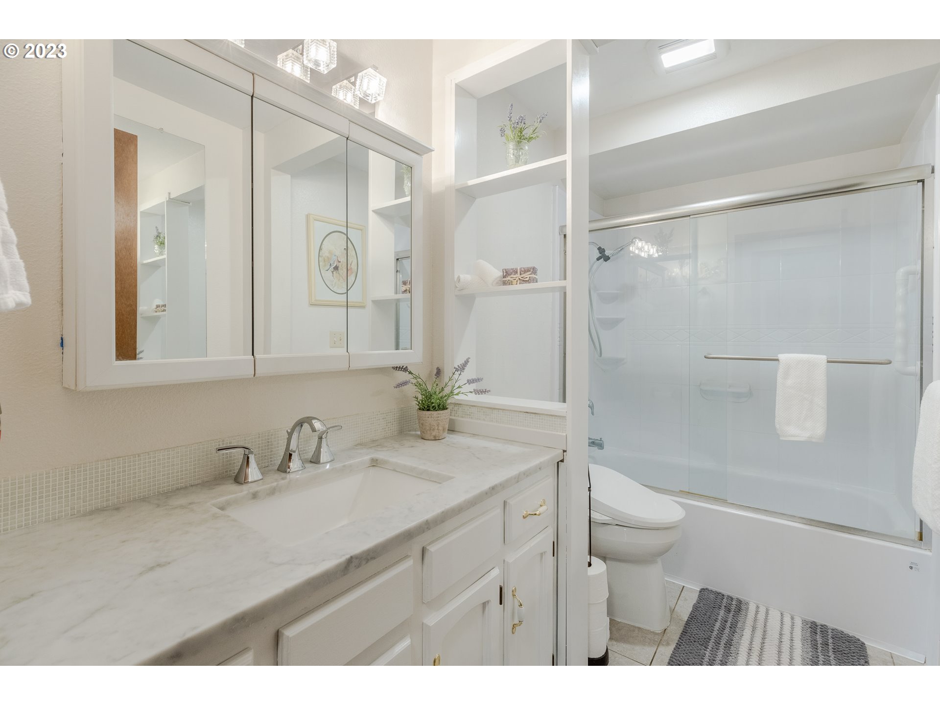 316 70th Street Springfield, OR 97478 - Photo 13 of 25 a bathroom with a sink a toilet and shower