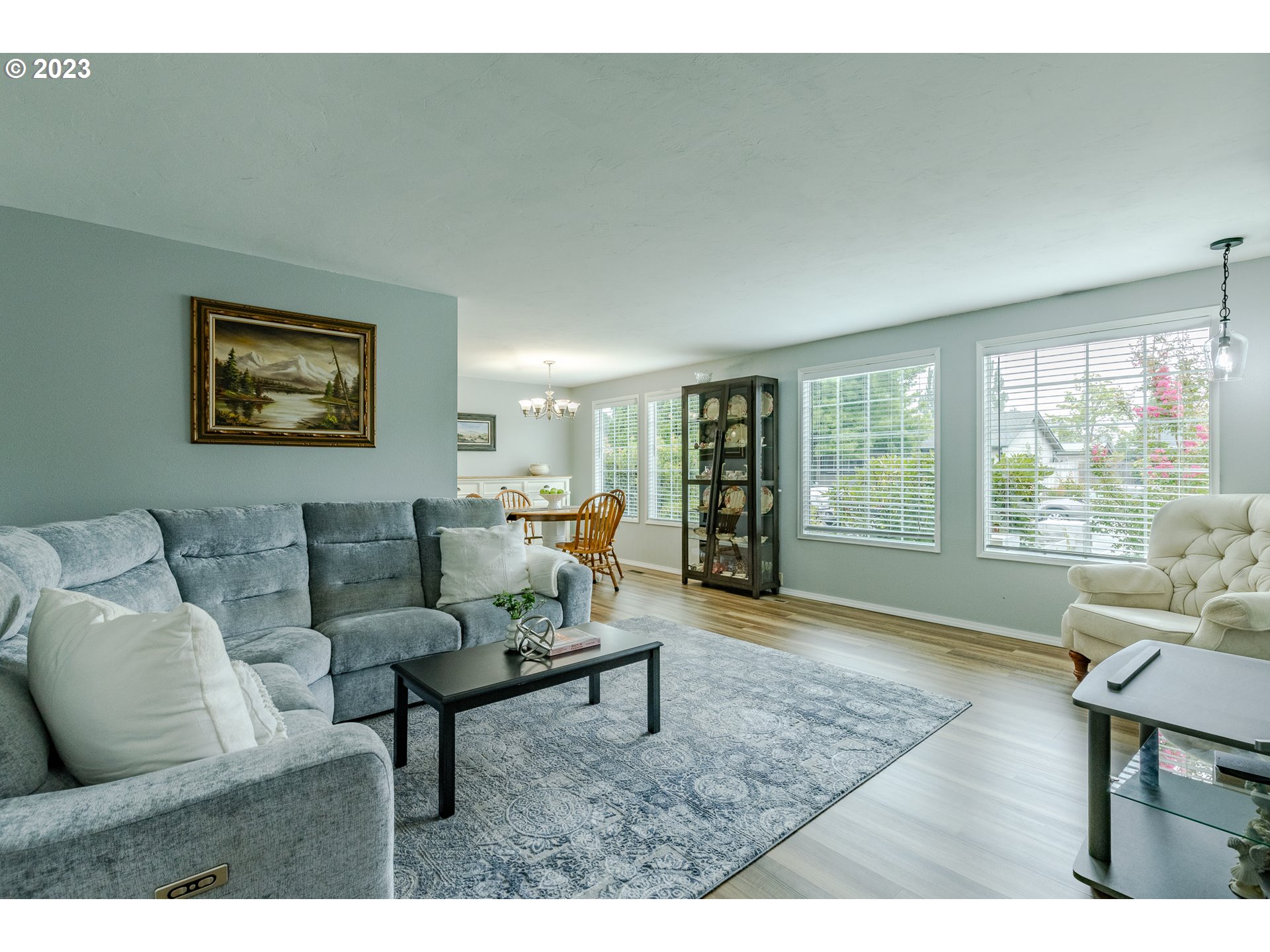 316 70th Street Springfield, OR 97478 - Photo 5 of 25 a living room with furniture and a large window