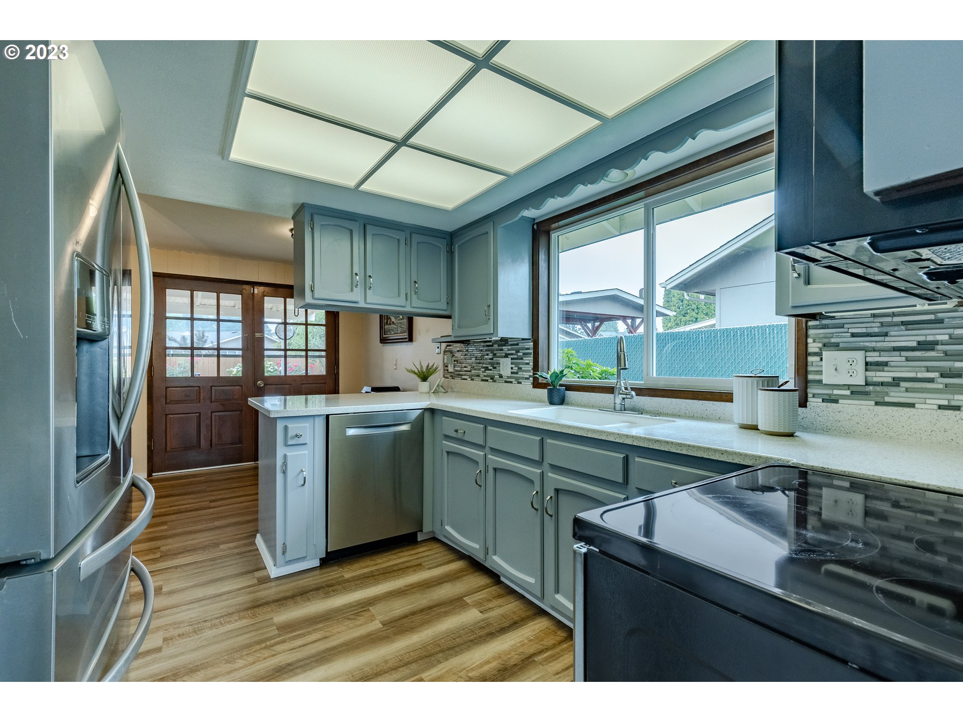 316 70th Street Springfield, OR 97478 - Photo 9 of 25 a kitchen with sink cabinets and window