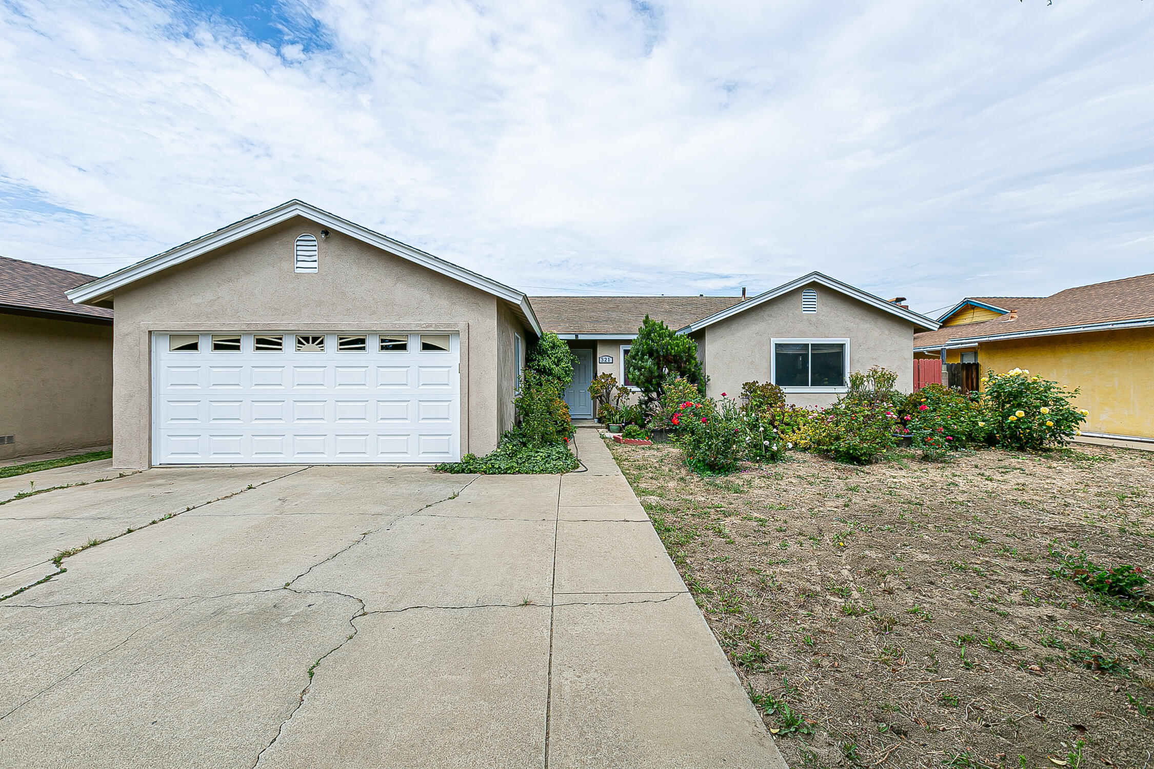 a view of garage and yard