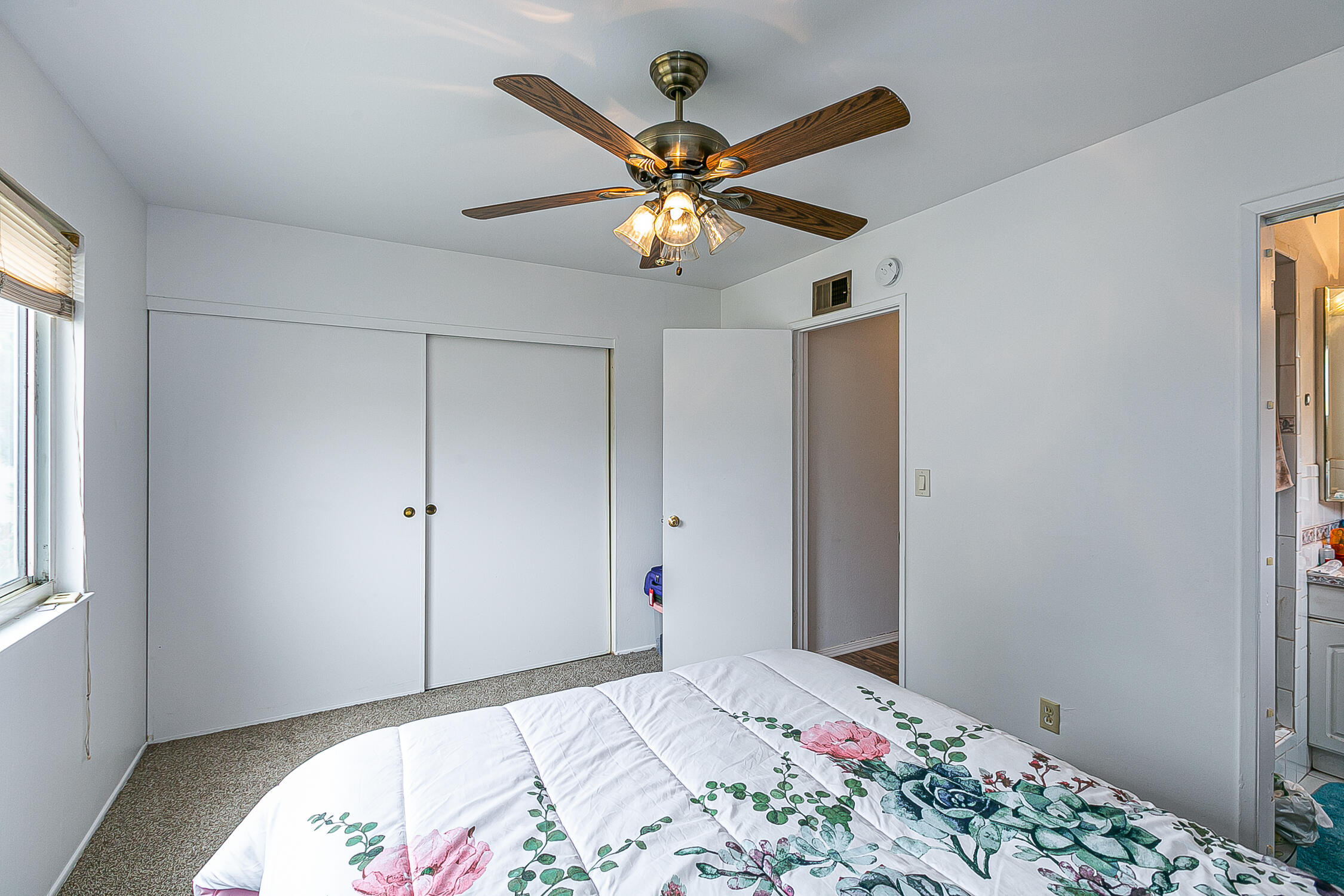 321 South T Street Lompoc, CA 93436 - Photo 17 of 29 a bedroom with bed and window
