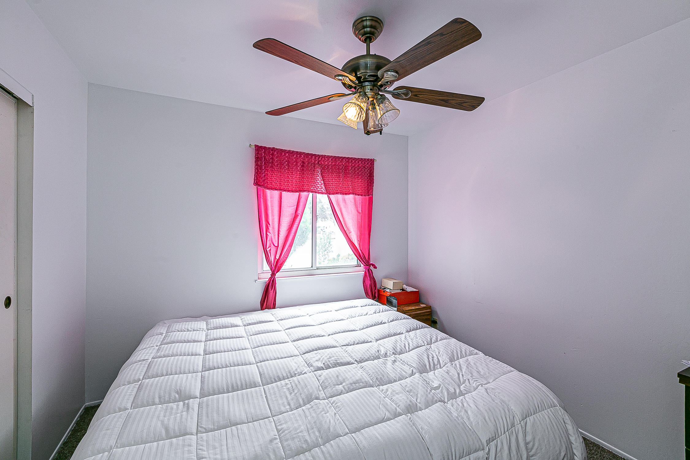 321 South T Street Lompoc, CA 93436 - Photo 23 of 29 a bedroom with a bed and a window