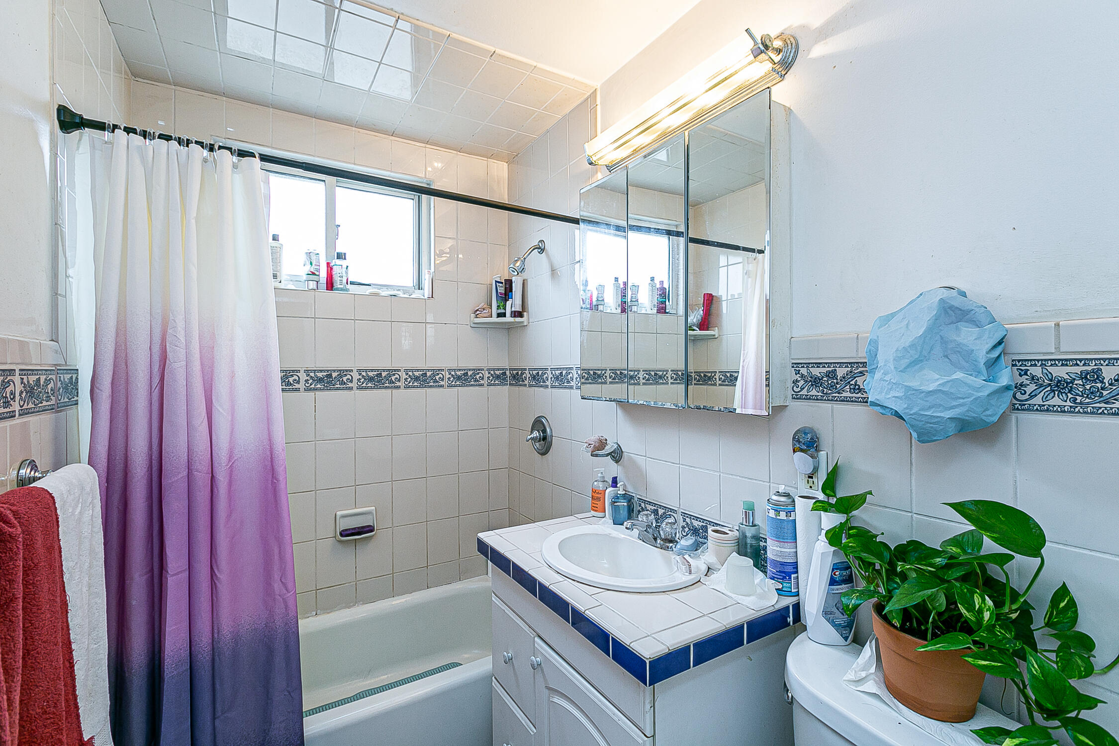 321 South T Street Lompoc, CA 93436 - Photo 25 of 29 a bathroom with a sink a vanity and a mirror