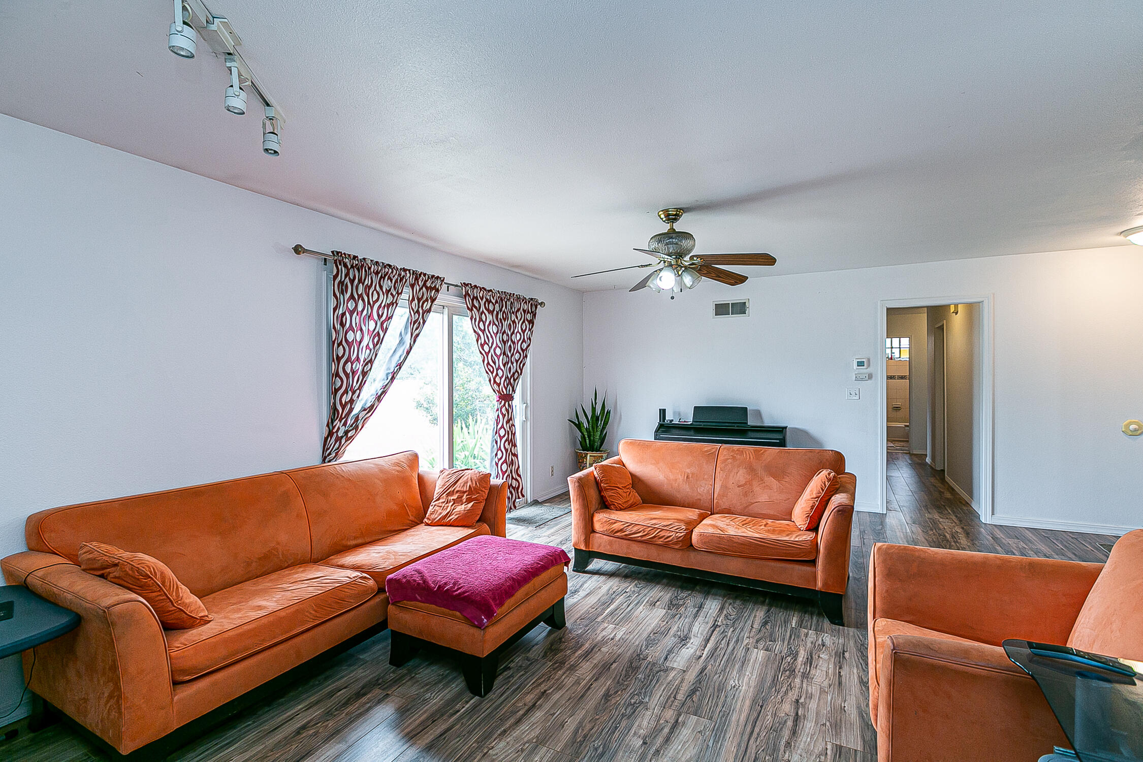321 South T Street Lompoc, CA 93436 - Photo 8 of 29 a living room with furniture and a window