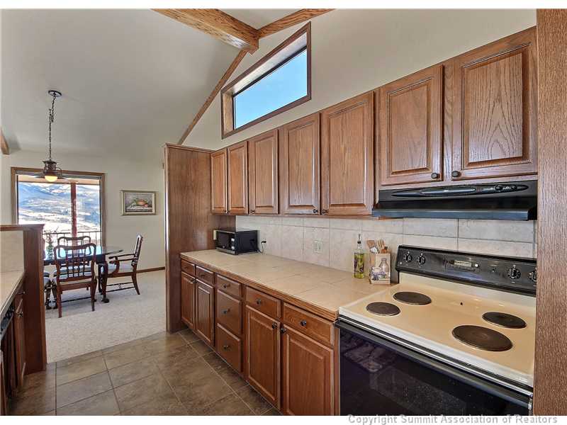48 AB Road Silverthorne, CO 80498 - Photo 15 of 25 Dining Room. Another picture of Kitchen that shows the Dining area....This home has windows every place you look!