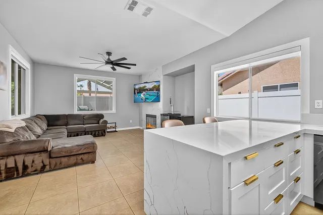 a living room with furniture and window