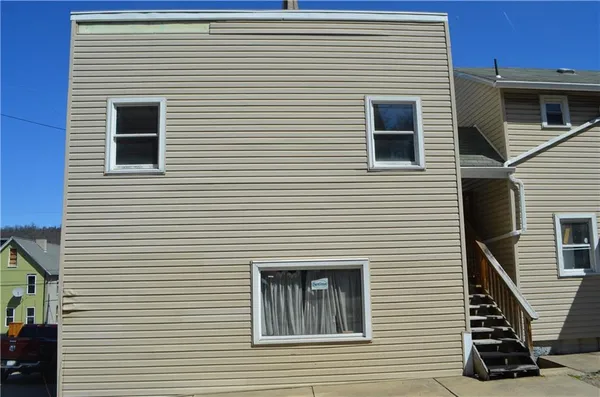 a view of a house with white door