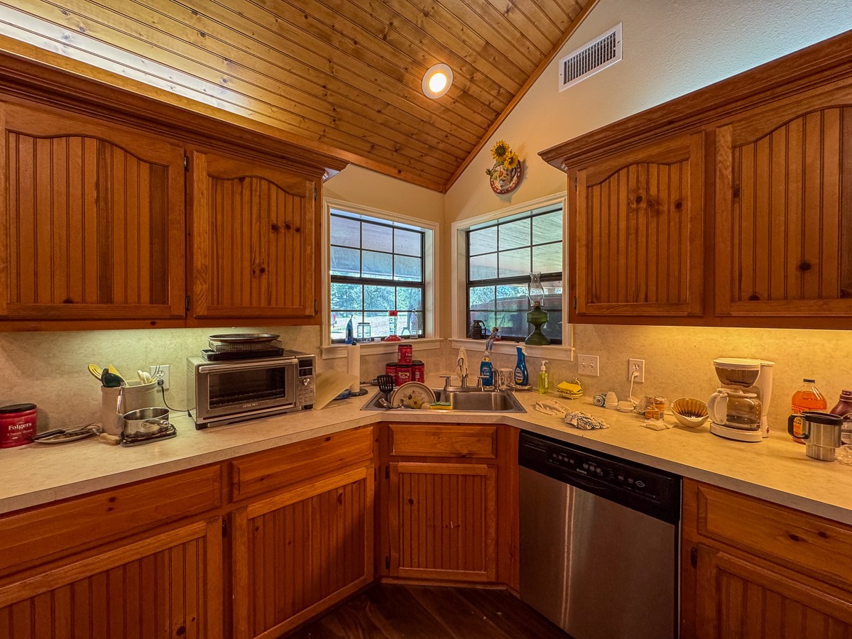 37 Archie Road Huntsville, TX 77320 - Photo 10 of 40 a kitchen with sink and cabinets