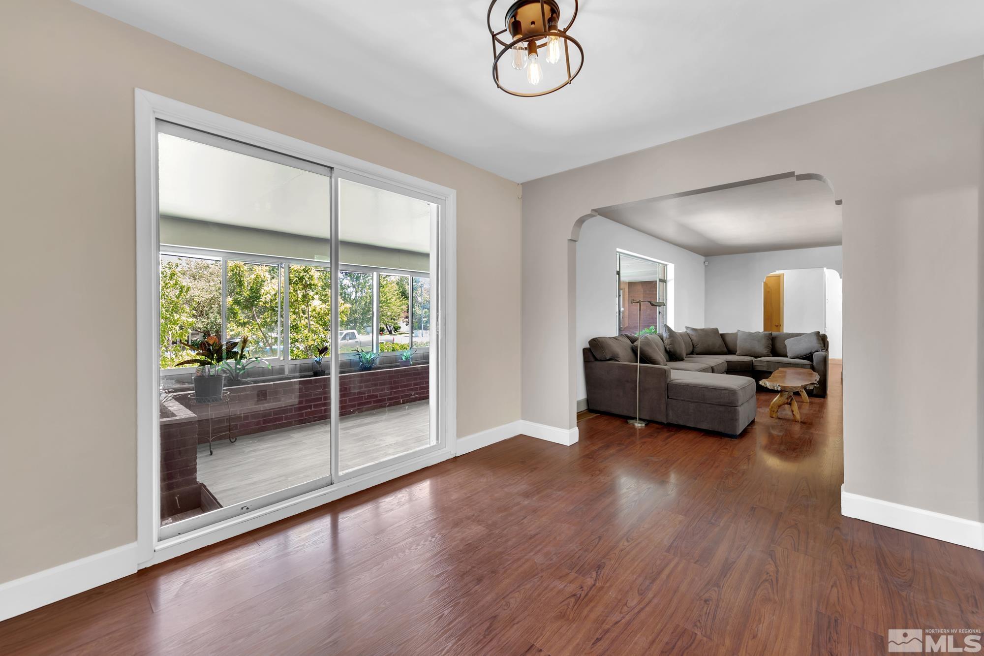 1595 Watt Street Reno, NV 89509 - Photo 8 of 39 a living room with furniture and a large window