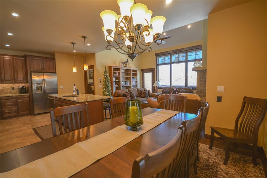 835 Independence Road, Unit 6B Keystone, CO 80435 - Photo 2 of 30 a large kitchen with a table and chairs