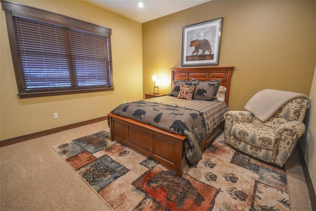 835 Independence Road, Unit 6B Keystone, CO 80435 - Photo 11 of 30 a bedroom with a bed and a couch