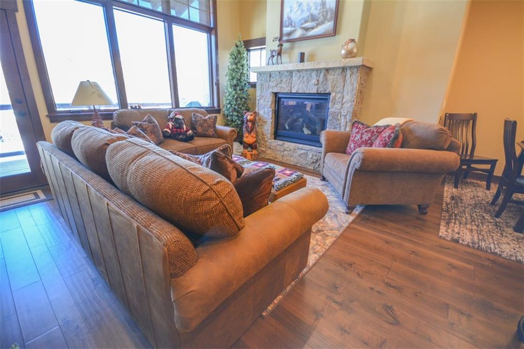 835 Independence Road, Unit 6B Keystone, CO 80435 - Photo 3 of 30 a living room with furniture and a fireplace