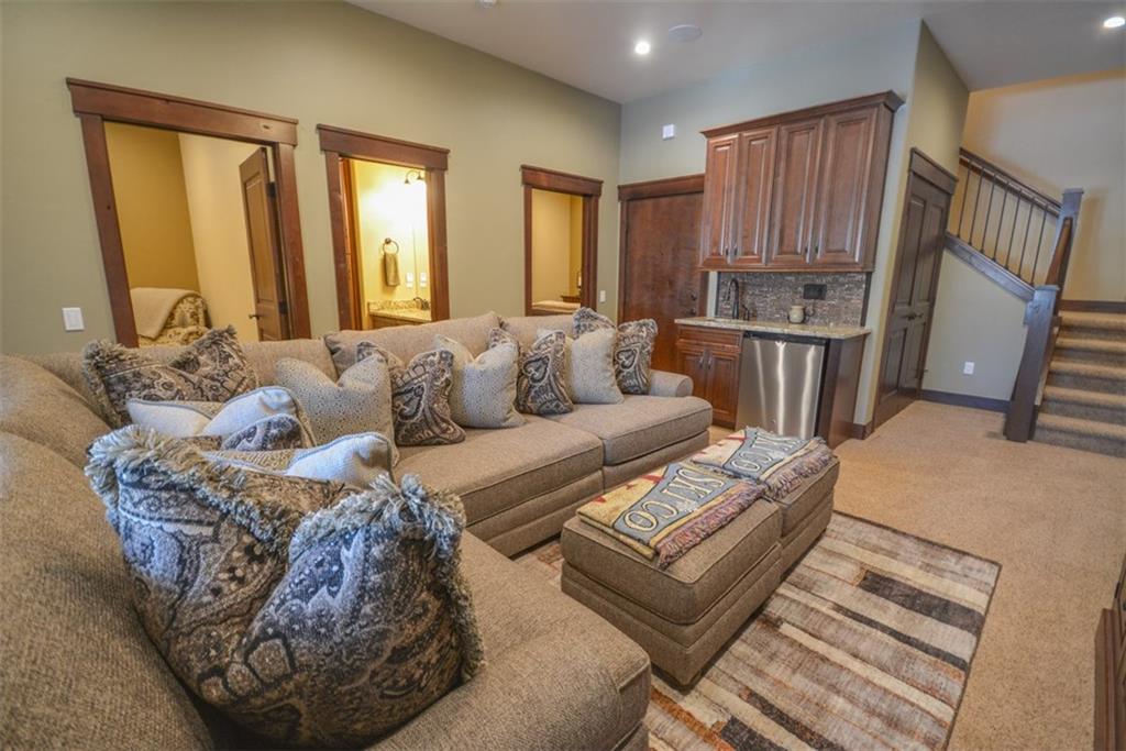 835 Independence Road, Unit 6B Keystone, CO 80435 - Photo 24 of 30 a living room with furniture fireplace and a window