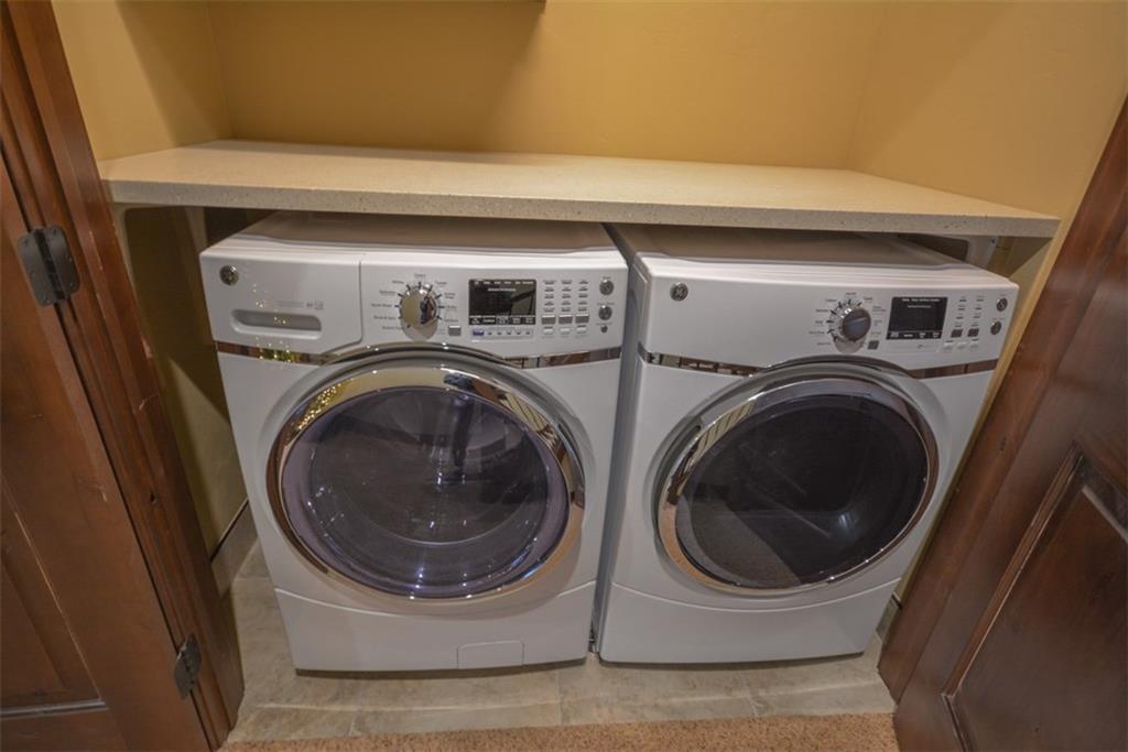 835 Independence Road, Unit 6B Keystone, CO 80435 - Photo 26 of 30 a utility room with dryer and washer