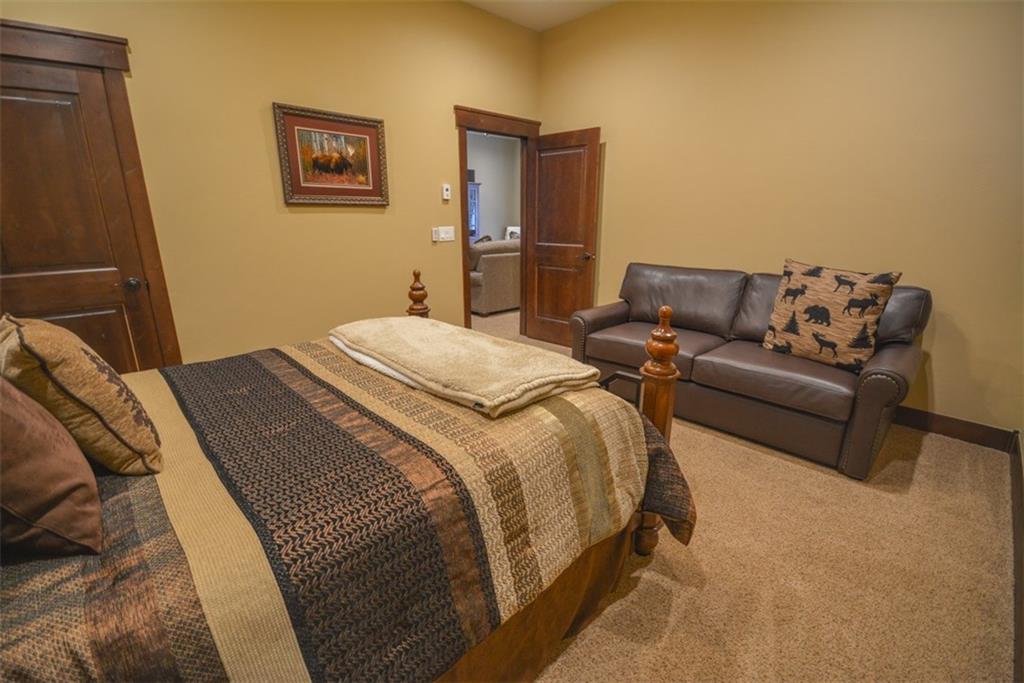 835 Independence Road, Unit 6B Keystone, CO 80435 - Photo 27 of 30 a bedroom with a bed and furniture