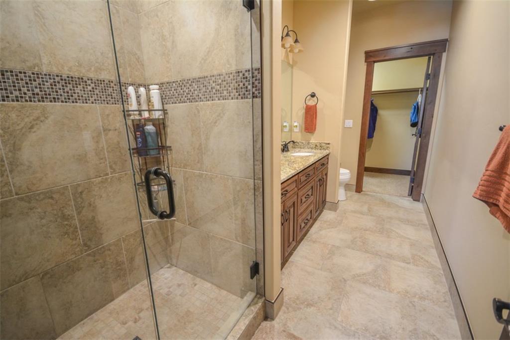 835 Independence Road, Unit 6B Keystone, CO 80435 - Photo 7 of 30 a bathroom with a granite countertop shower and a sink