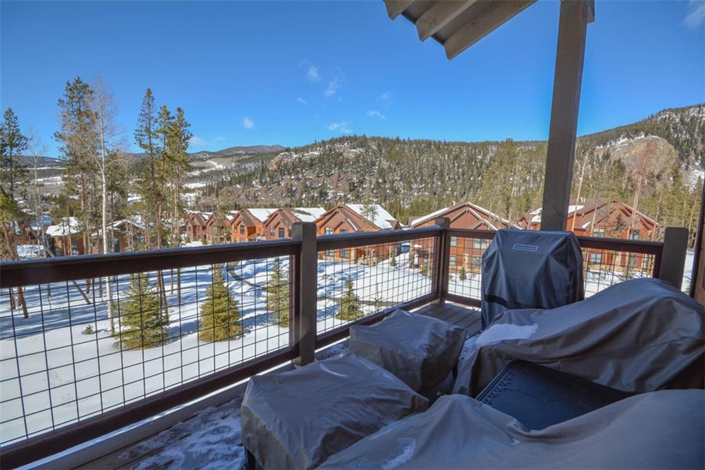 835 Independence Road, Unit 6B Keystone, CO 80435 - Photo 8 of 30 a view of a balcony with wooden floor and outdoor seating
